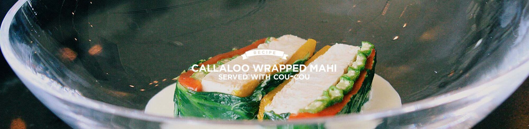 Callaloo Wrapped Mahi served with Cou-Cou