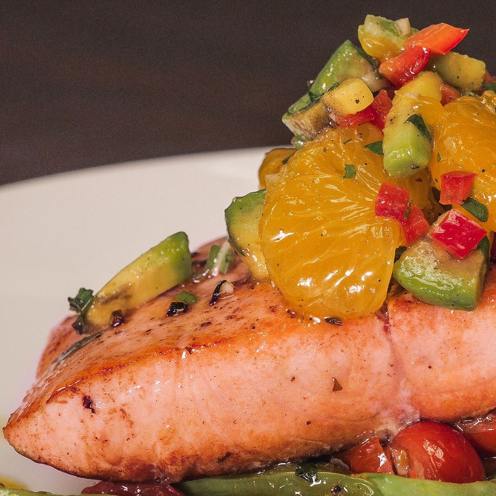 Salmon covered in Avocado Orange Salsa with String Beans & Cherry Tomatoes