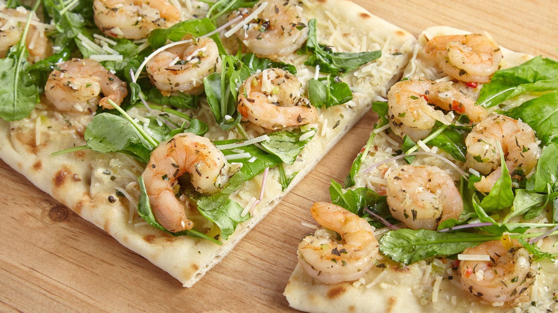 Shrimp Alfredo Flatbread with spicy Arugula